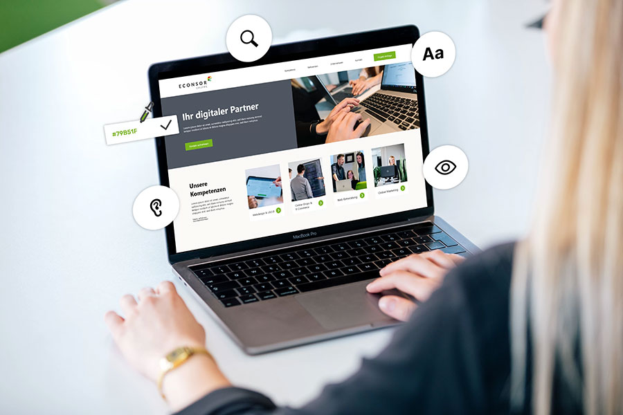 Person betrachtet auf einem Laptop die Website der Digitalagentur ECONSOR mit Fokus auf digitale Barrierefreiheit und Usability-Funktionen